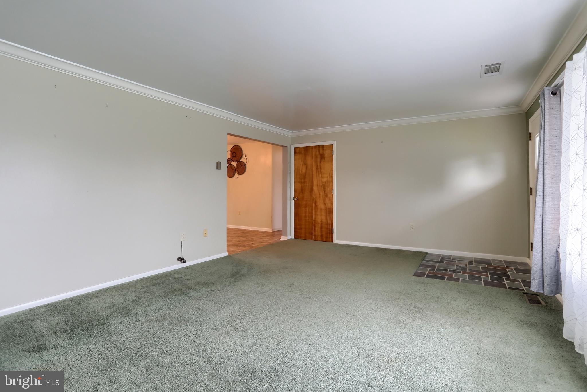 2040 Miller Road East Petersburg, PA 17520 - Photo 28 of 49 an empty room with an entryway and fireplace