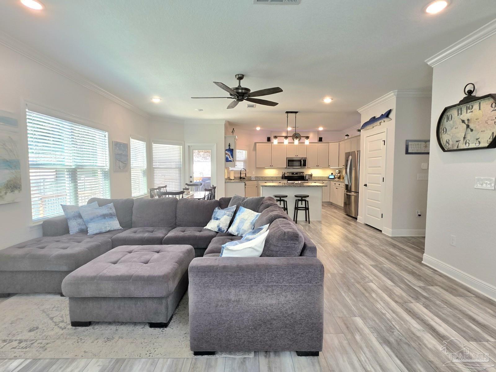 1307 Heron Inlet Pensacola, FL 32506 - Photo 11 of 35 a living room with furniture and a large window