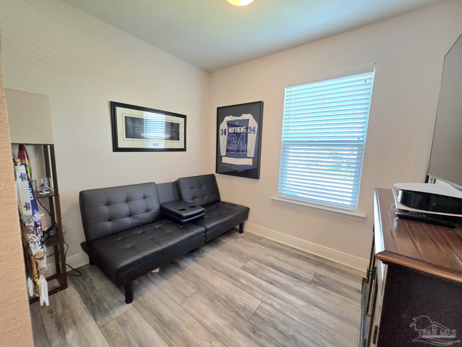 1307 Heron Inlet Pensacola, FL 32506 - Photo 18 of 35 a living room with furniture and a window