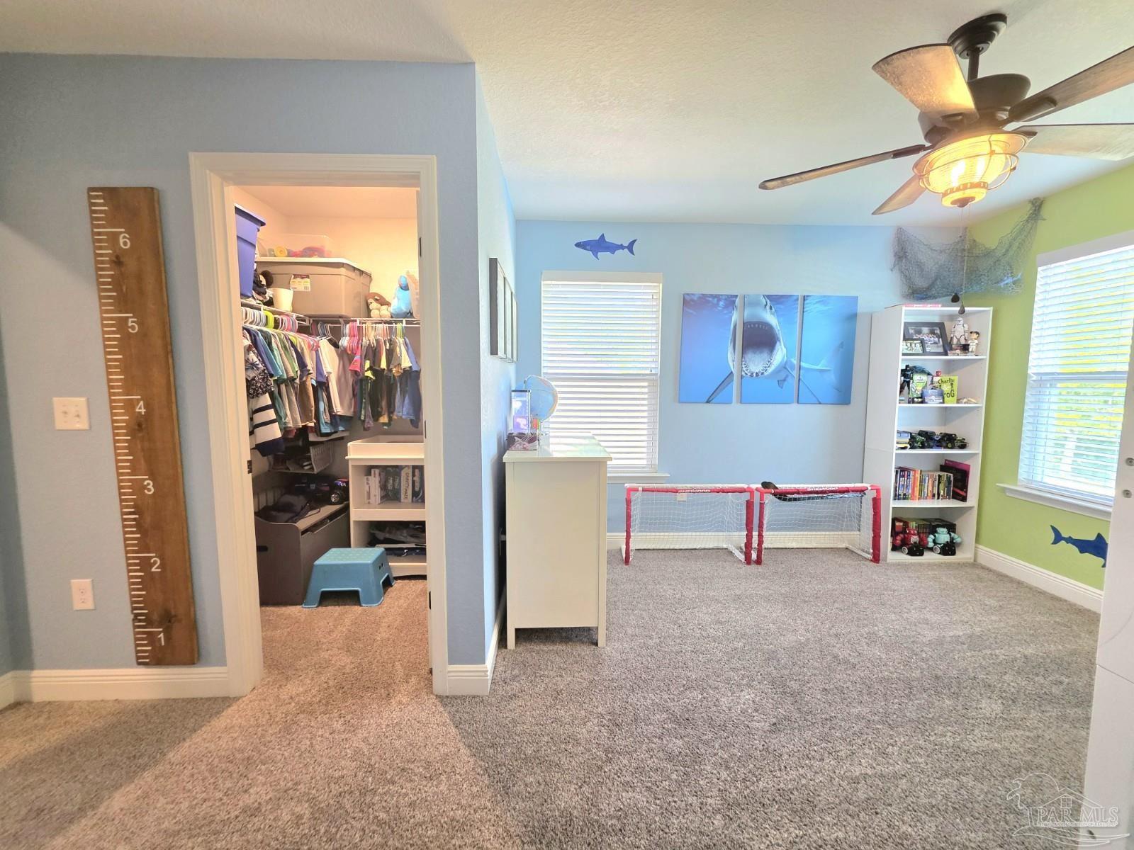 1307 Heron Inlet Pensacola, FL 32506 - Photo 21 of 35 a view of a livingroom with workspace and a window