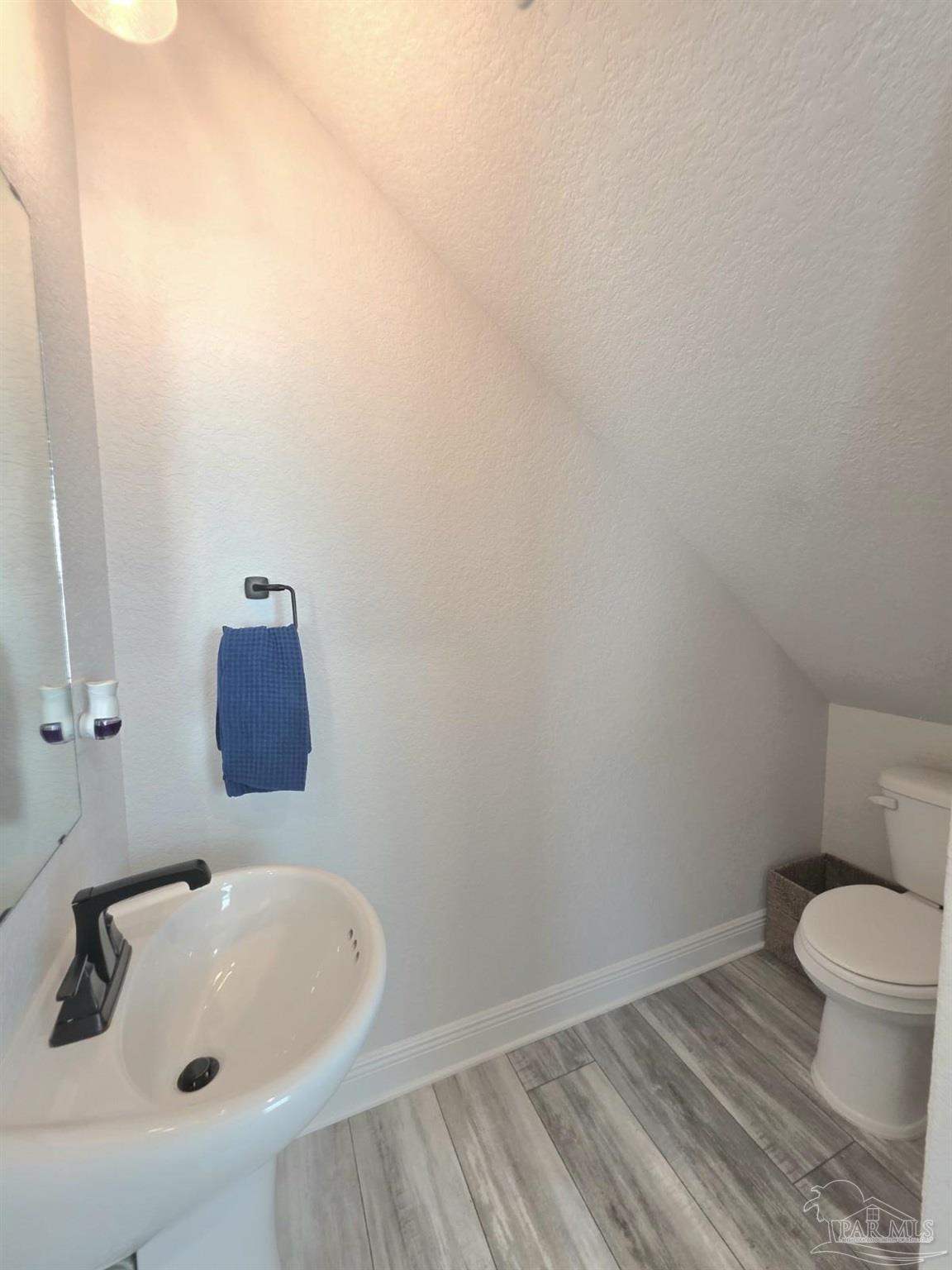 1307 Heron Inlet Pensacola, FL 32506 - Photo 26 of 35 a bathroom with a sink and toilet