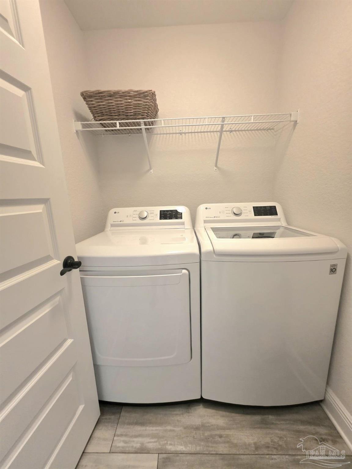 1307 Heron Inlet Pensacola, FL 32506 - Photo 27 of 35 a utility room with dryer and washer