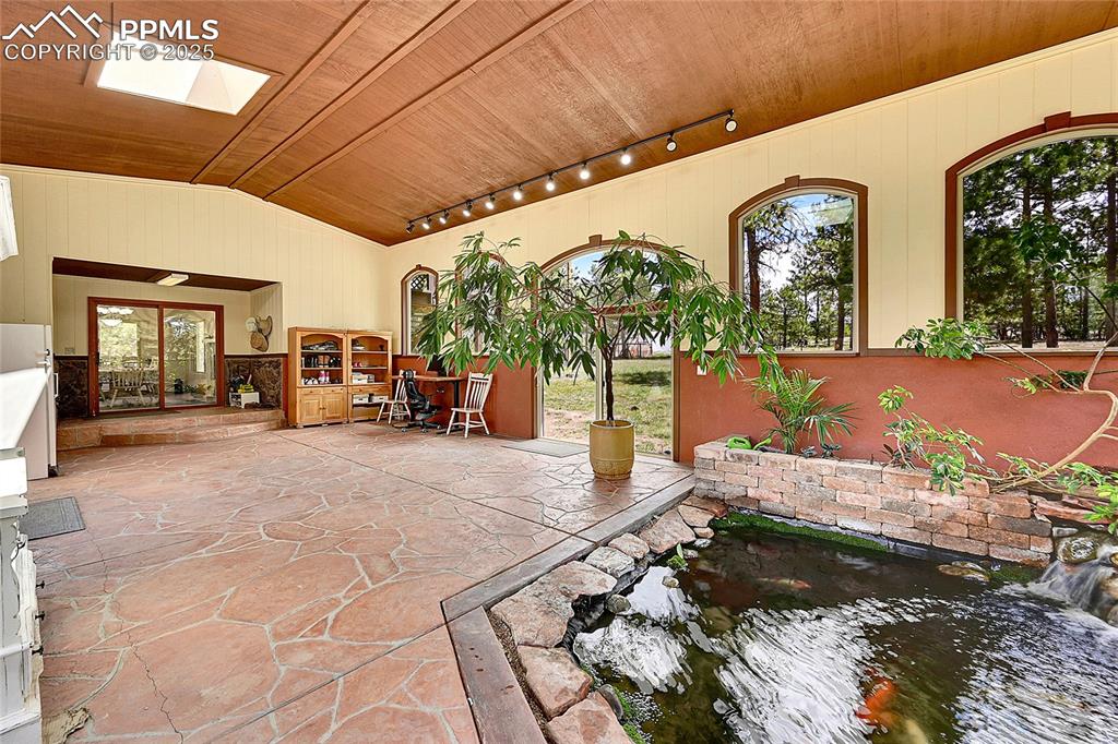 17350 Goshawk Road Colorado Springs, CO 80908 - Photo 33 of 50 a view of a porch with furniture