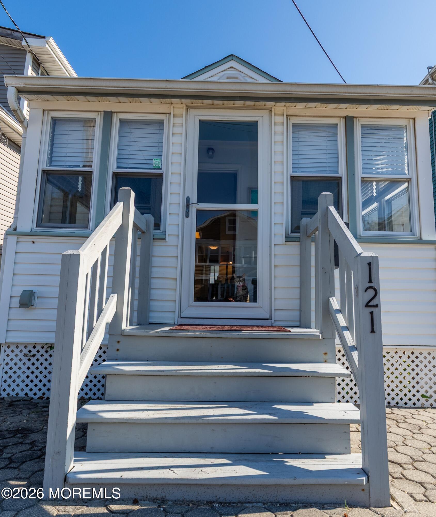 121 L Street Seaside Park, NJ 08752 - Photo 1 of 37 a view of entryway and hall with wooden floor