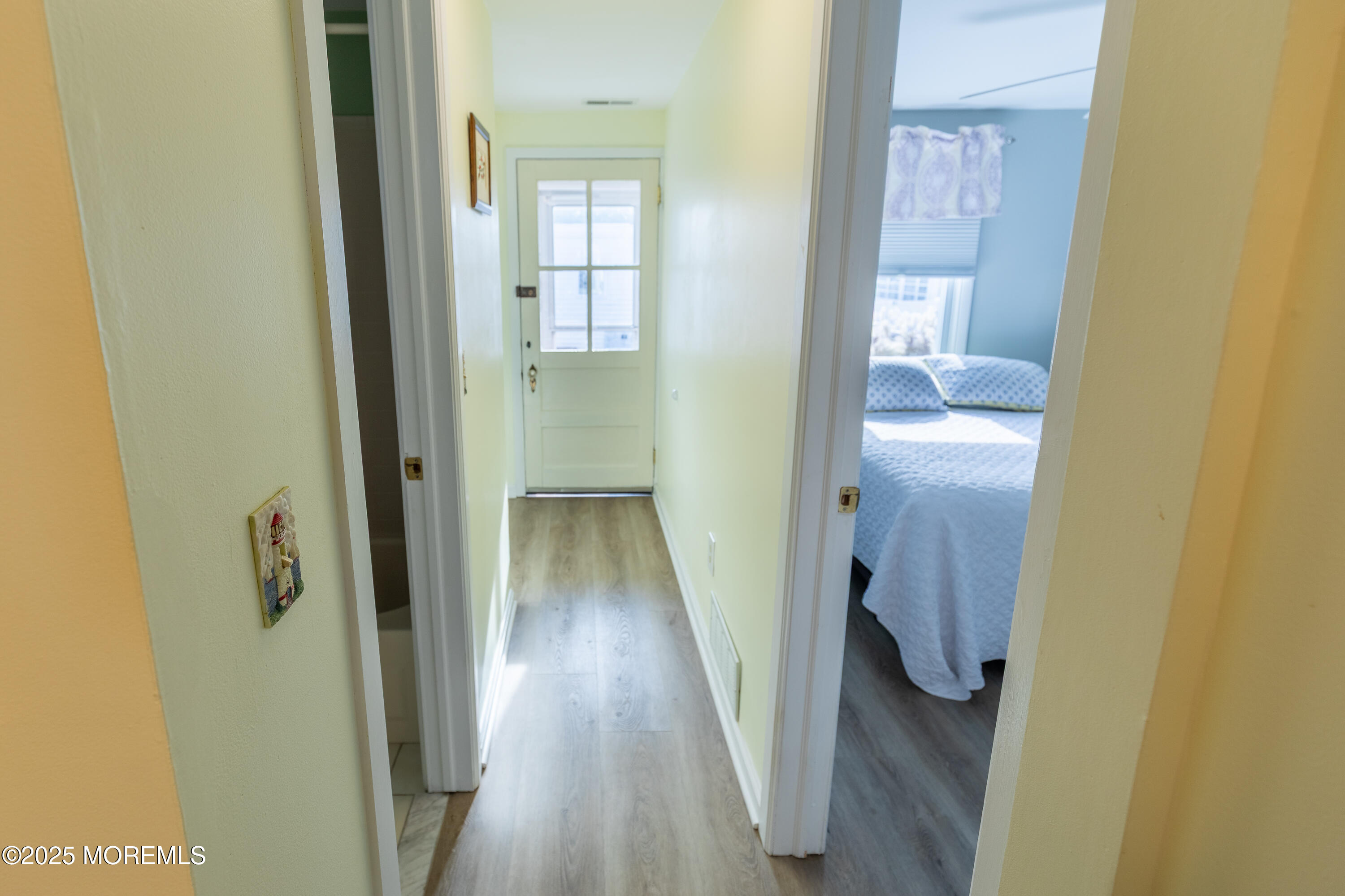 121 L Street Seaside Park, NJ 08752 - Photo 14 of 37 a bathroom with a sink and glass door