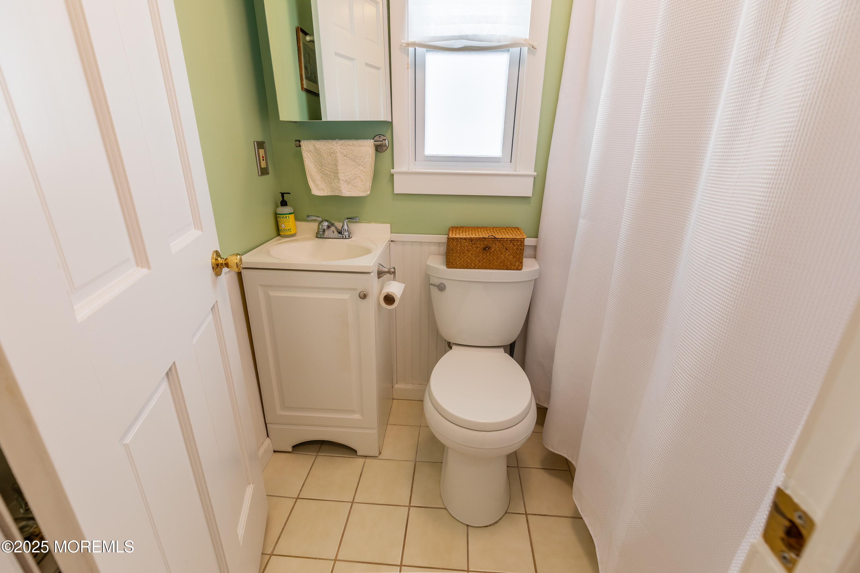 121 L Street Seaside Park, NJ 08752 - Photo 15 of 37 a bathroom with a sink and a toilet
