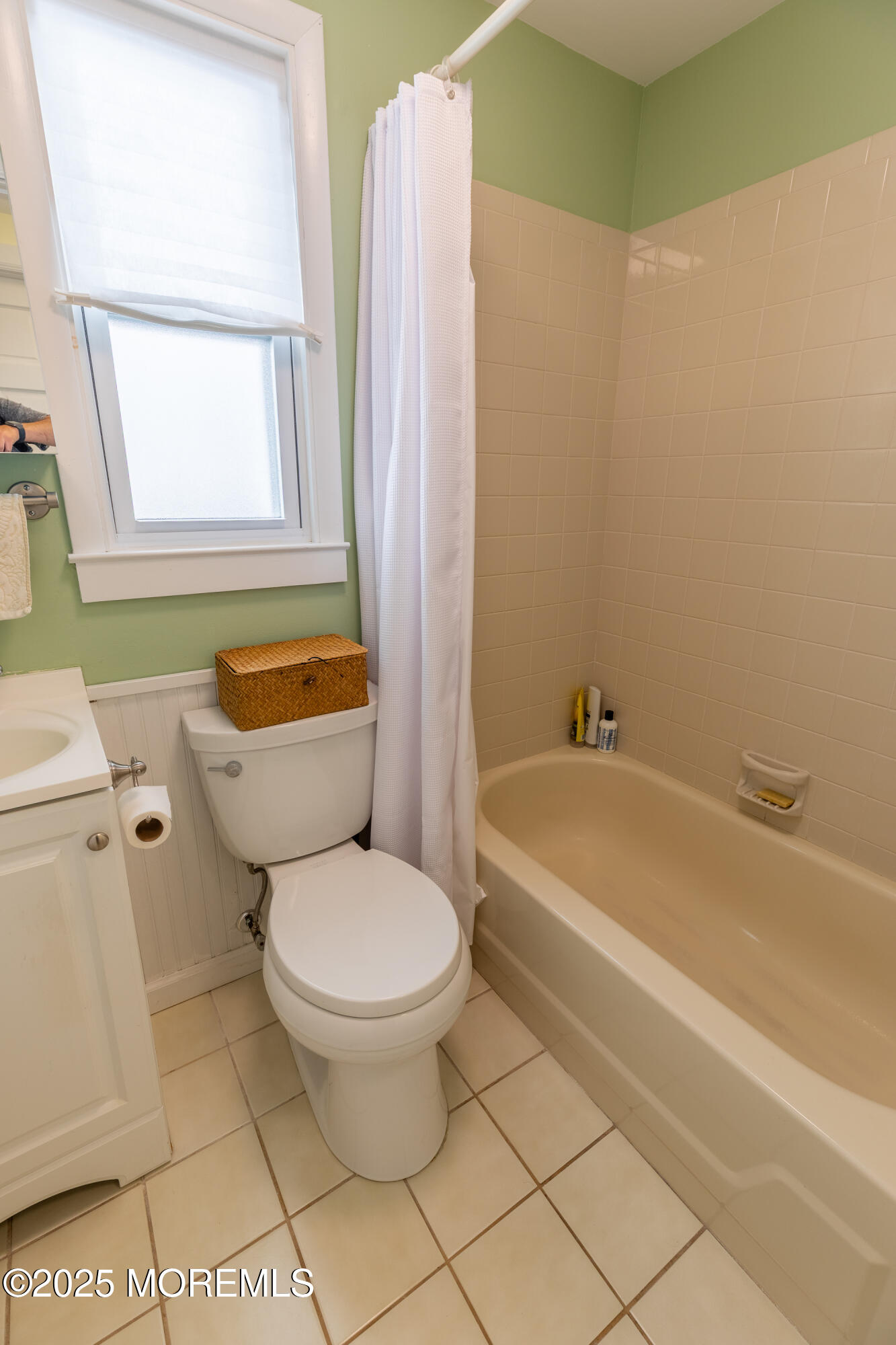 121 L Street Seaside Park, NJ 08752 - Photo 16 of 37 a bathroom with a toilet a sink and a bathtub