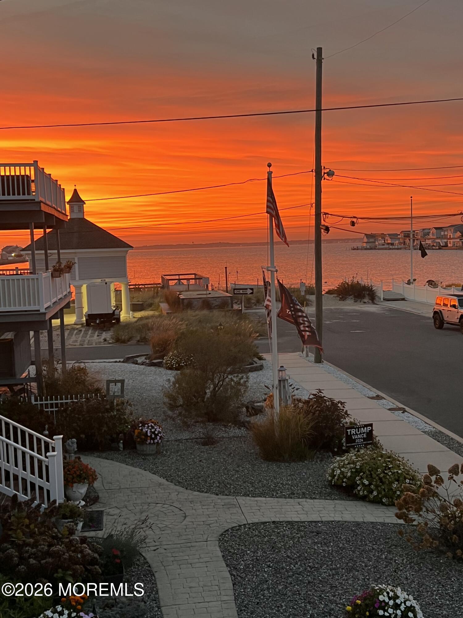 121 L Street Seaside Park, NJ 08752 - Photo 2 of 37 a view of a street with an ocean view