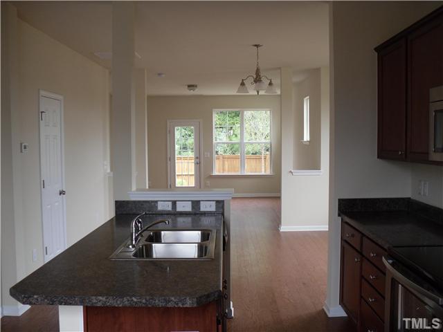 2966 Berkeley Street, Unit 25 Raleigh, NC 27612 - Photo 3 of 23 View of the main level from the kitchen. Great space perfect for entertaining guests.
