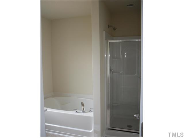 2966 Berkeley Street, Unit 25 Raleigh, NC 27612 - Photo 10 of 23 Master bathroom features a garden tub and separate shower!