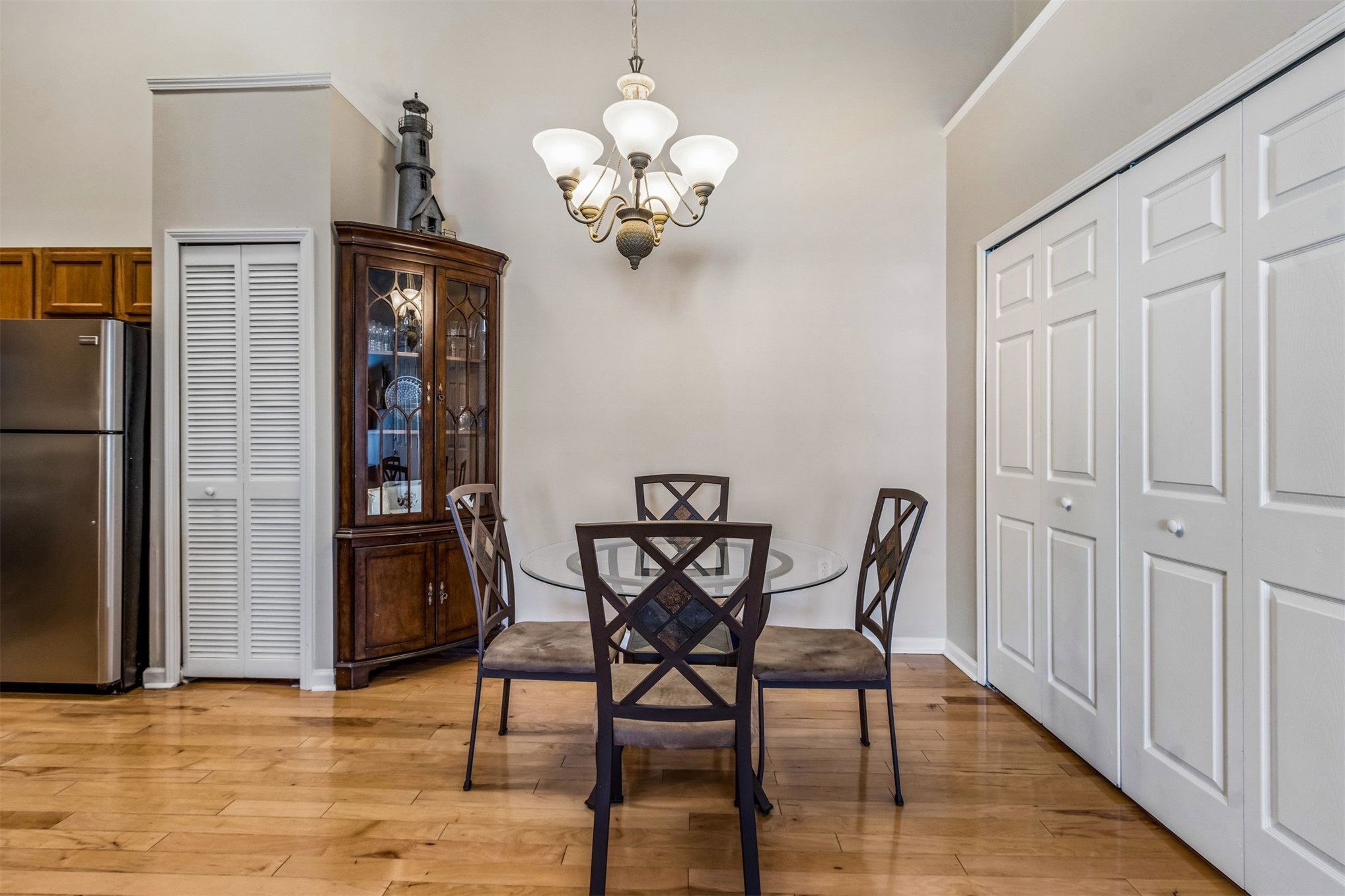 1601 Nectarine Street, Unit A6 Fernandina Beach, FL 32034 - Photo 11 of 40 a view of a dining room with furniture and wooden floor