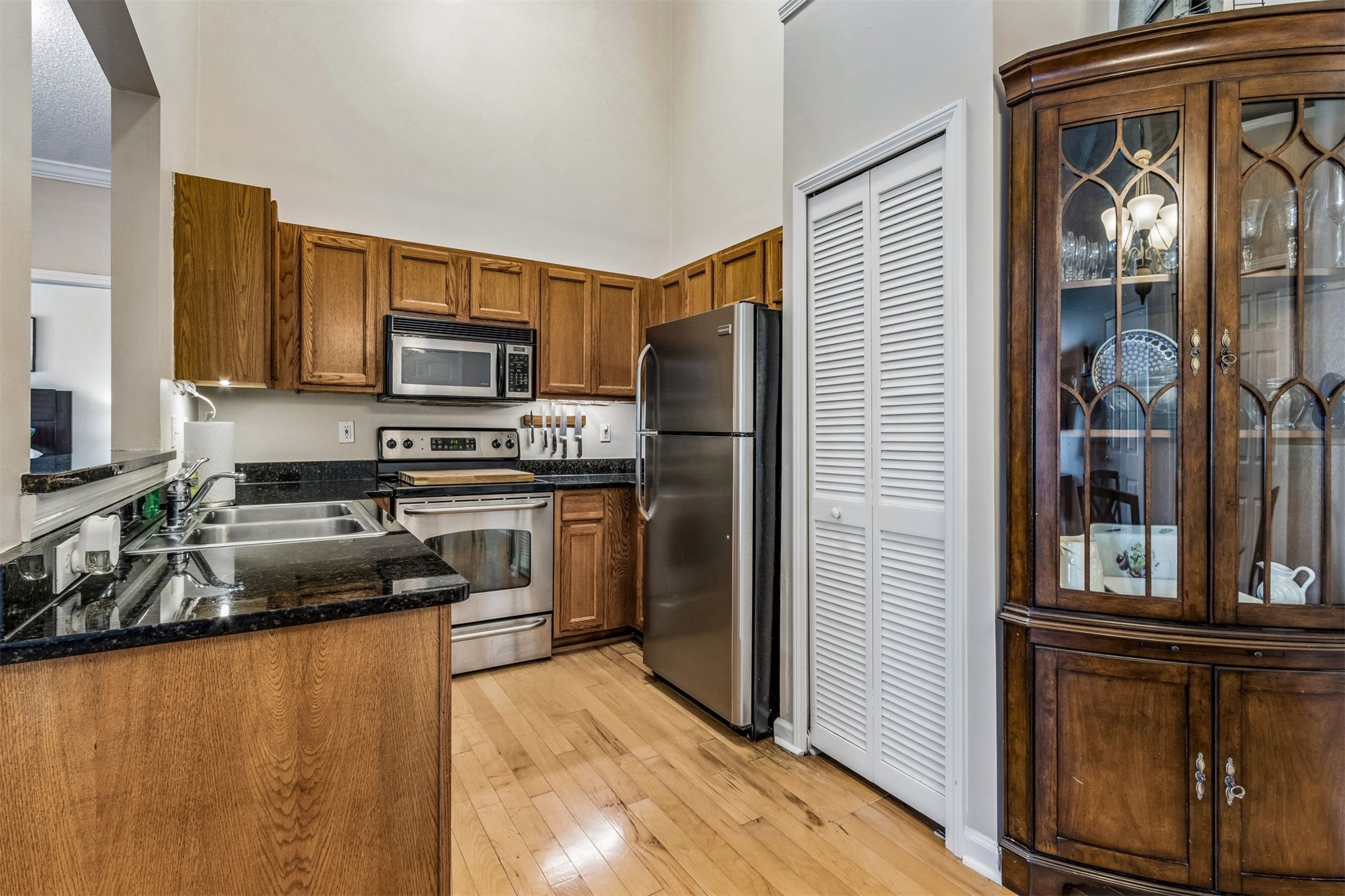 1601 Nectarine Street, Unit A6 Fernandina Beach, FL 32034 - Photo 14 of 40 a kitchen with a refrigerator stove and a sink
