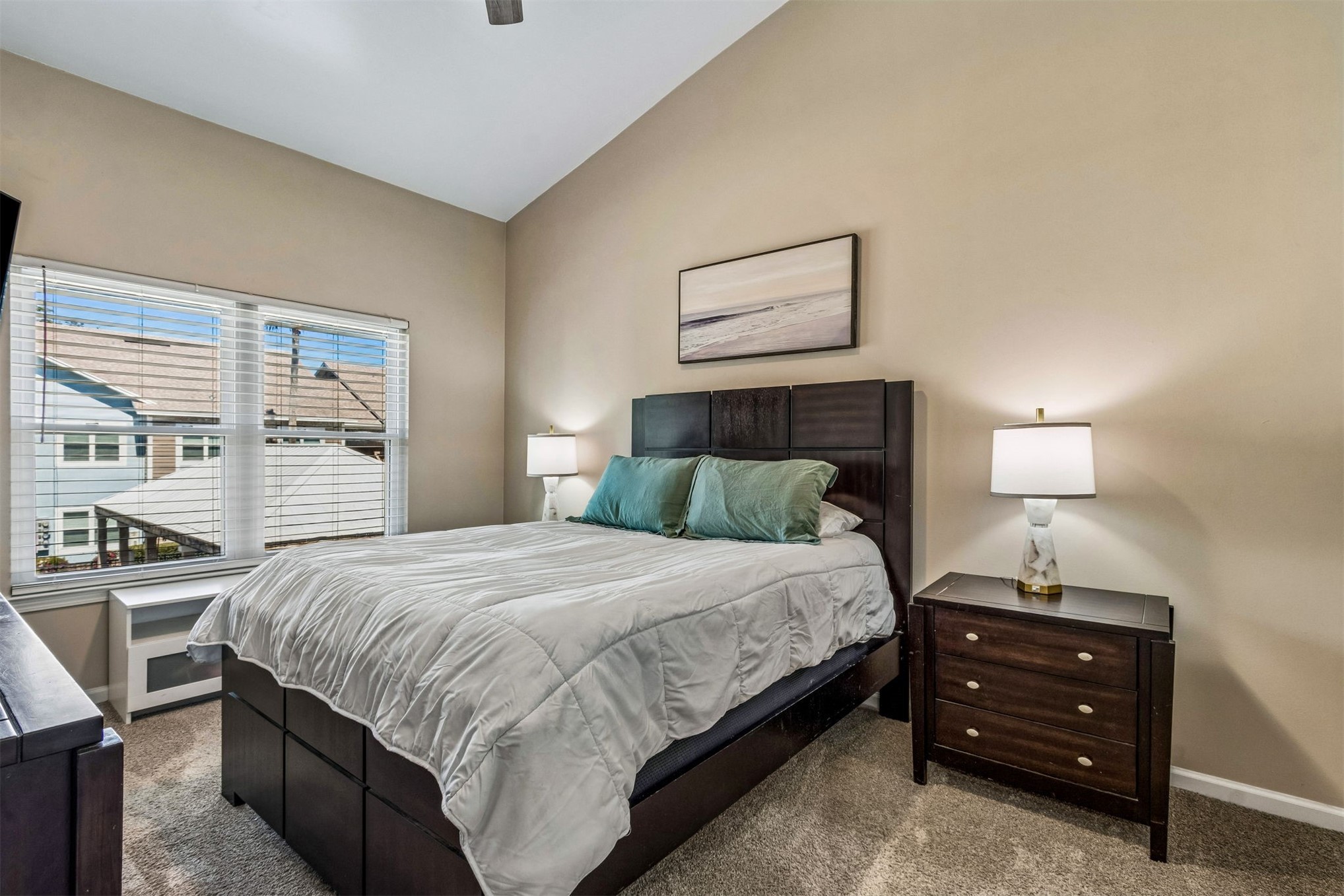 1601 Nectarine Street, Unit A6 Fernandina Beach, FL 32034 - Photo 17 of 40 a bedroom with a bed and a window