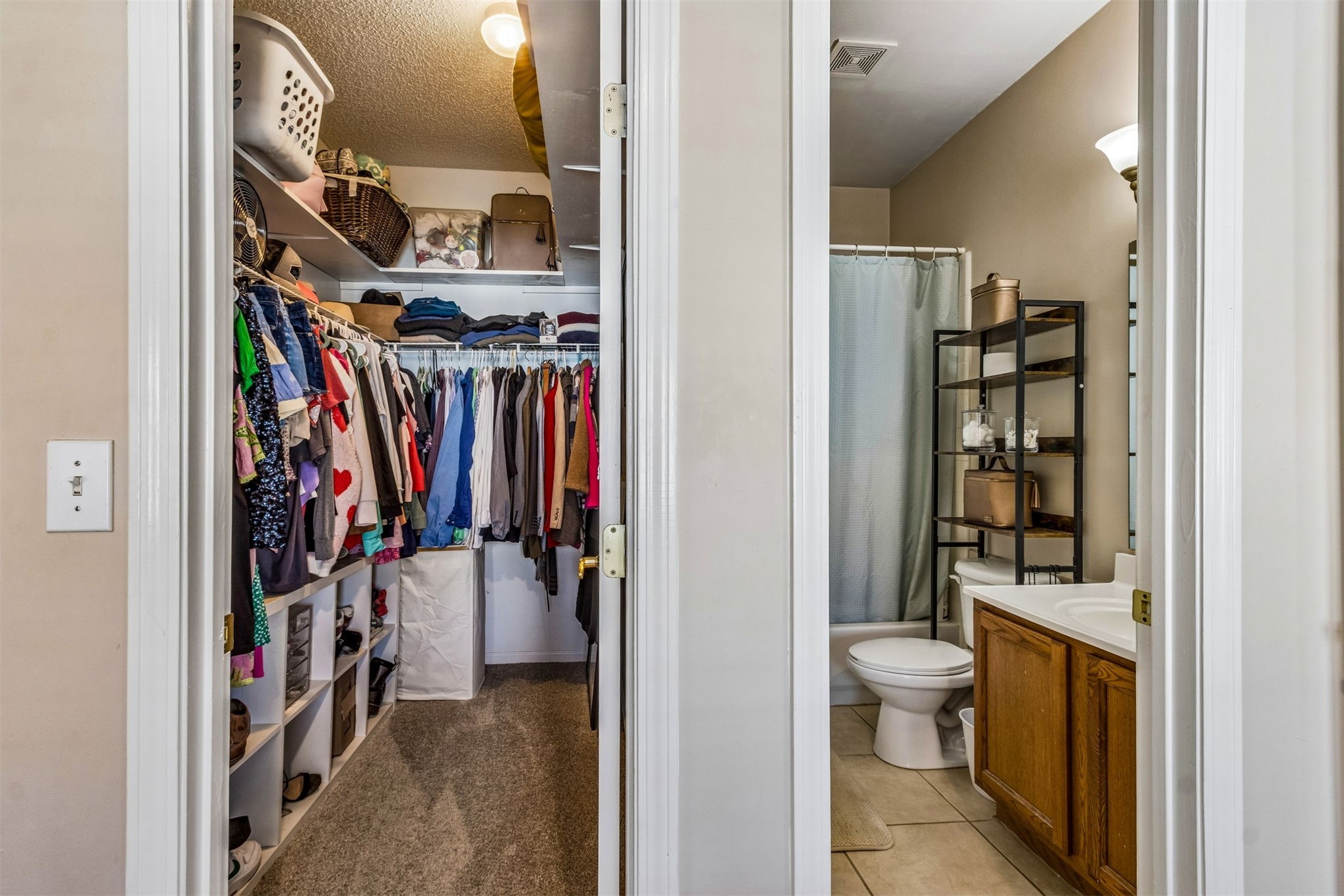 1601 Nectarine Street, Unit A6 Fernandina Beach, FL 32034 - Photo 20 of 40 a view of walk in closet with clothes and shoes
