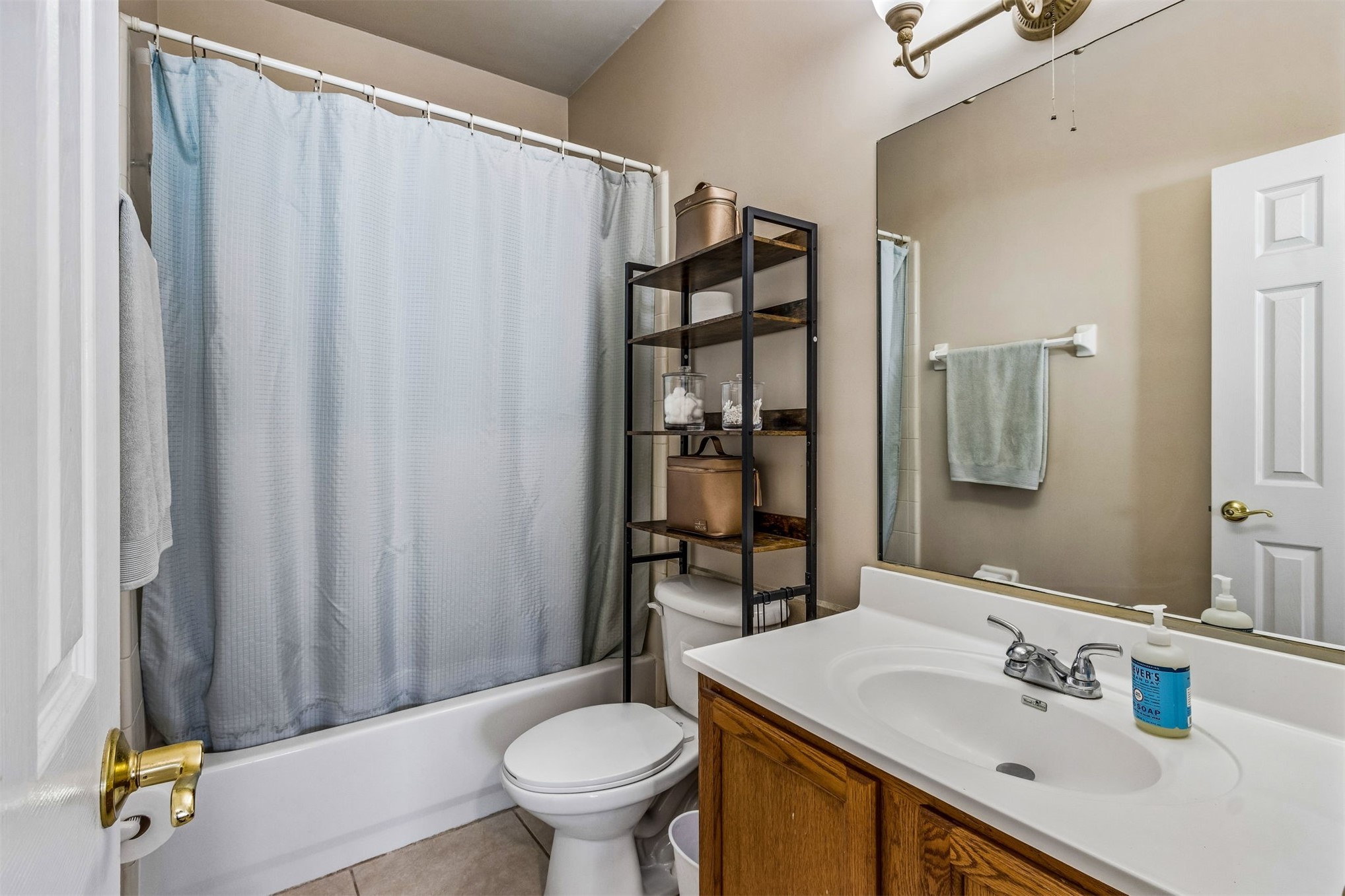 1601 Nectarine Street, Unit A6 Fernandina Beach, FL 32034 - Photo 21 of 40 a bathroom with a sink toilet and shower