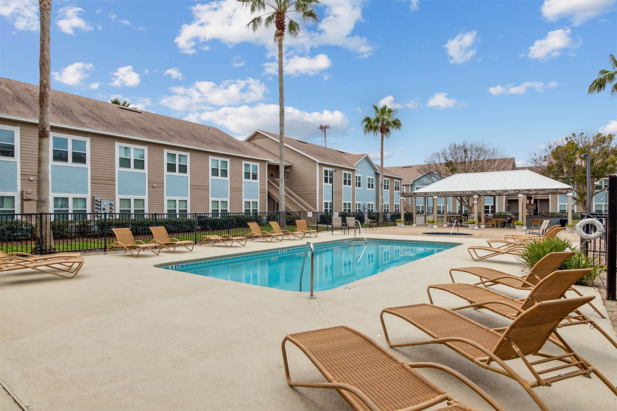 1601 Nectarine Street, Unit A6 Fernandina Beach, FL 32034 - Photo 26 of 40 a view of a house with swimming pool and sitting area