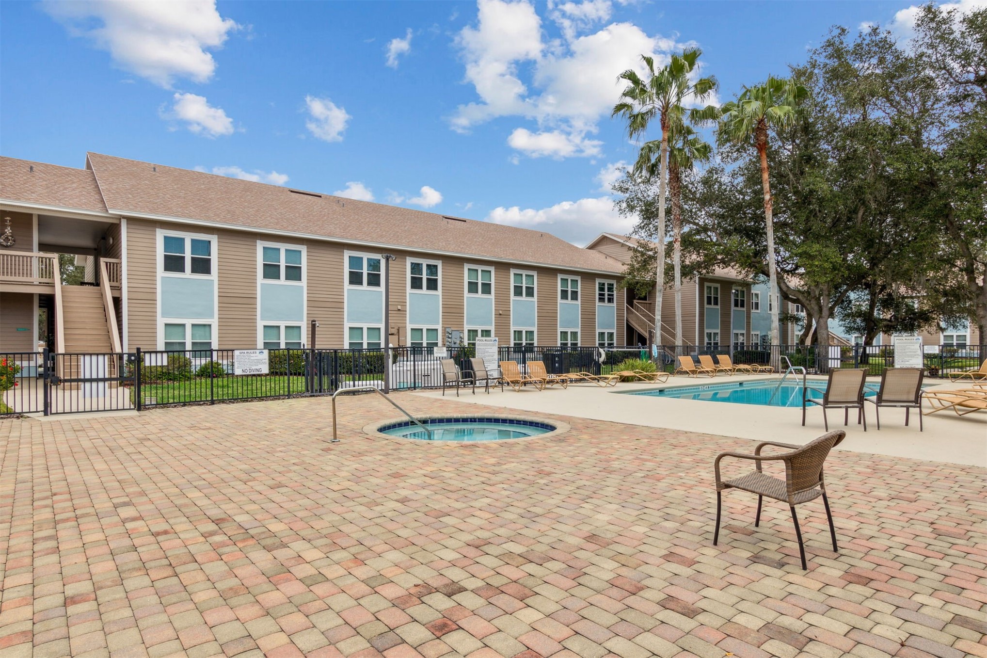 1601 Nectarine Street, Unit A6 Fernandina Beach, FL 32034 - Photo 29 of 40 a view of swimming pool with outdoor seating and a patio