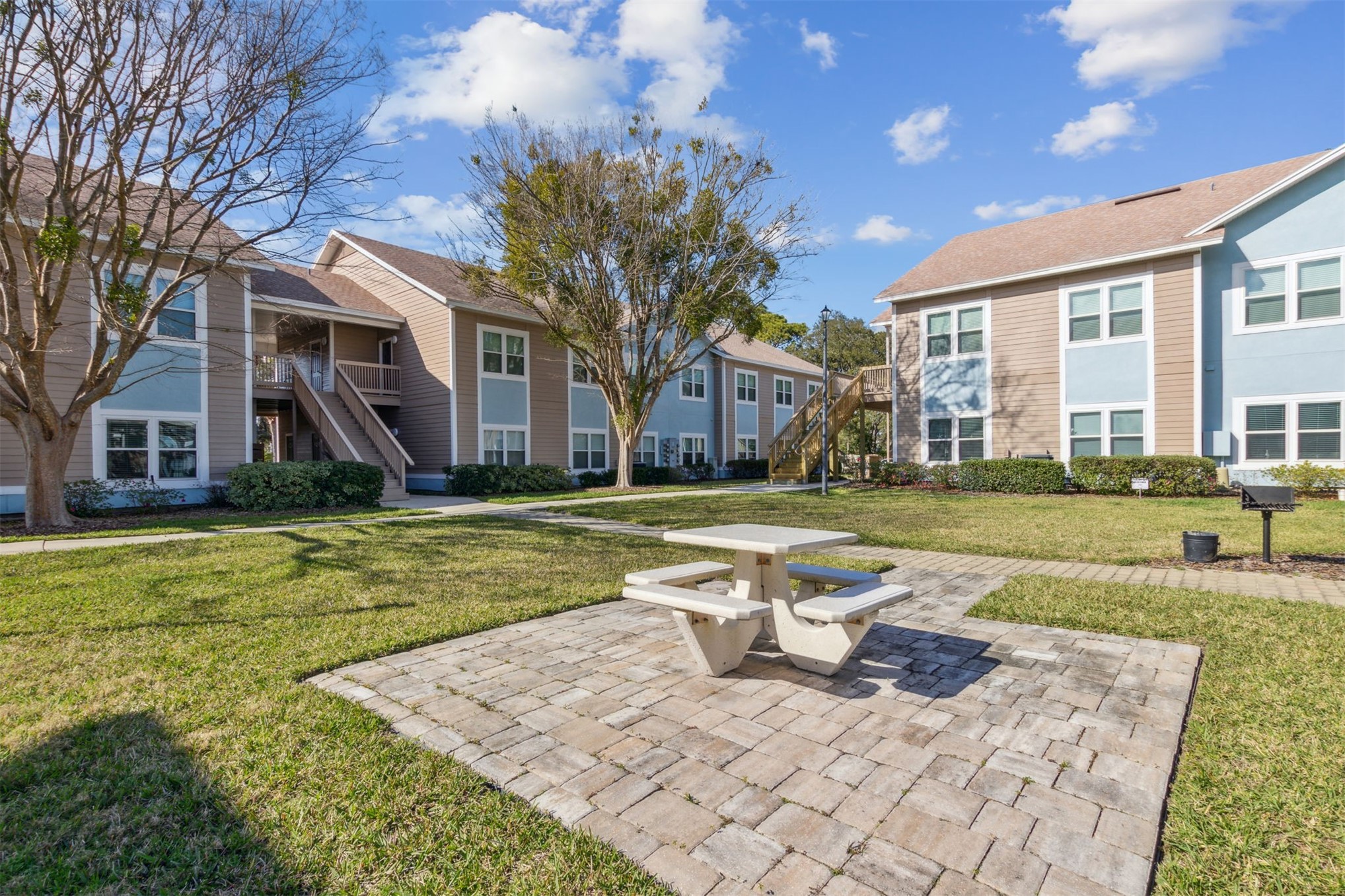 1601 Nectarine Street, Unit A6 Fernandina Beach, FL 32034 - Photo 38 of 40 a view of a house with swimming pool and yard