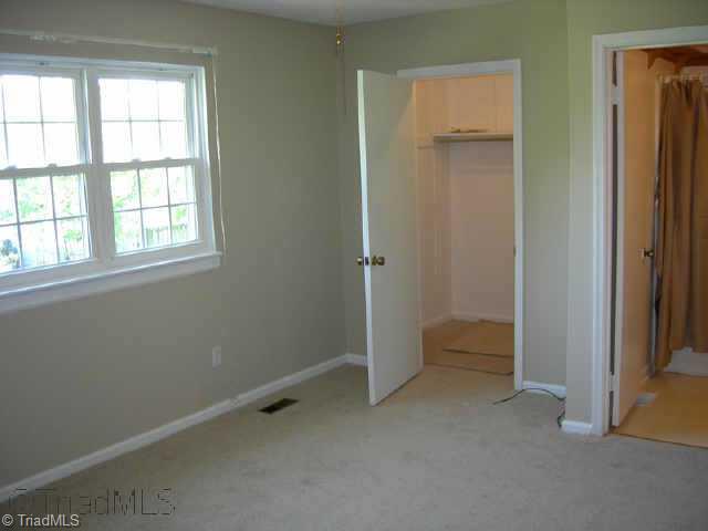 5741 Bramblegate Road, Unit A Greensboro, NC 27409 - Photo 7 of 9 Other. Master Bedroom - Freshly painted and brand new carpet!
