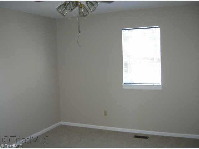 5741 Bramblegate Road, Unit A Greensboro, NC 27409 - Photo 8 of 9 Other. Second bedroom - Freshly painted and brand new carpet!