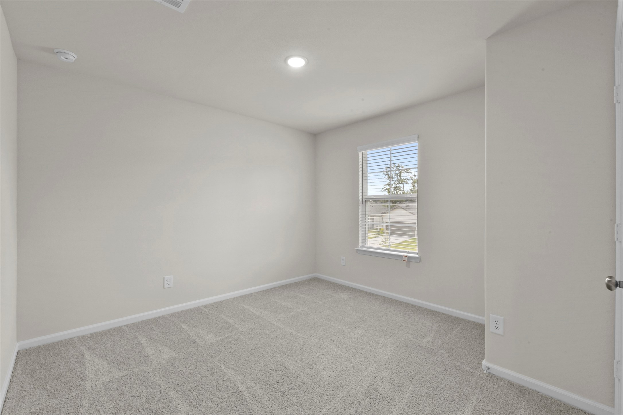 20811 Adventure Way Porter, TX 77365 - Photo 12 of 28 an empty room with a window