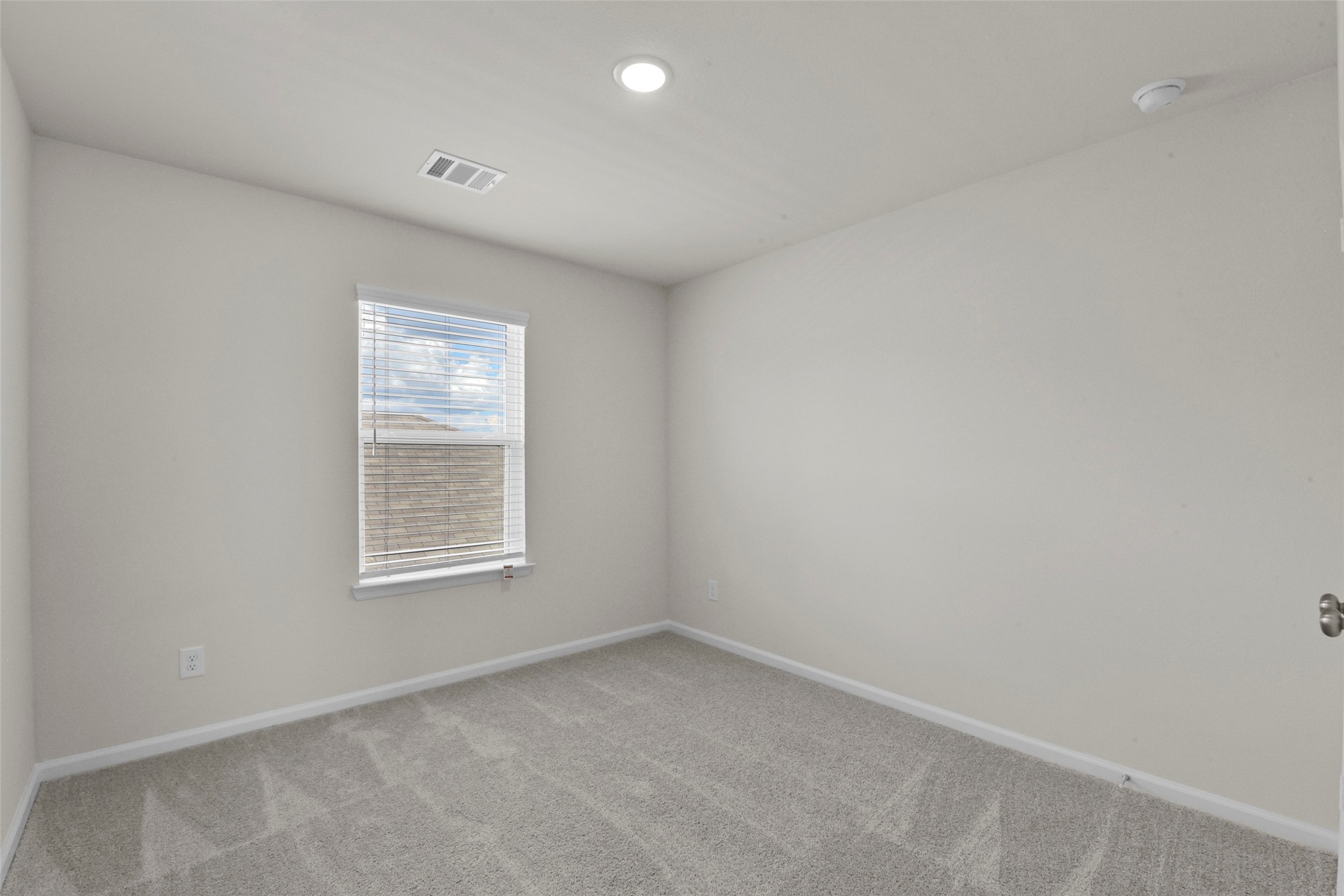 20811 Adventure Way Porter, TX 77365 - Photo 16 of 28 an empty room with a window