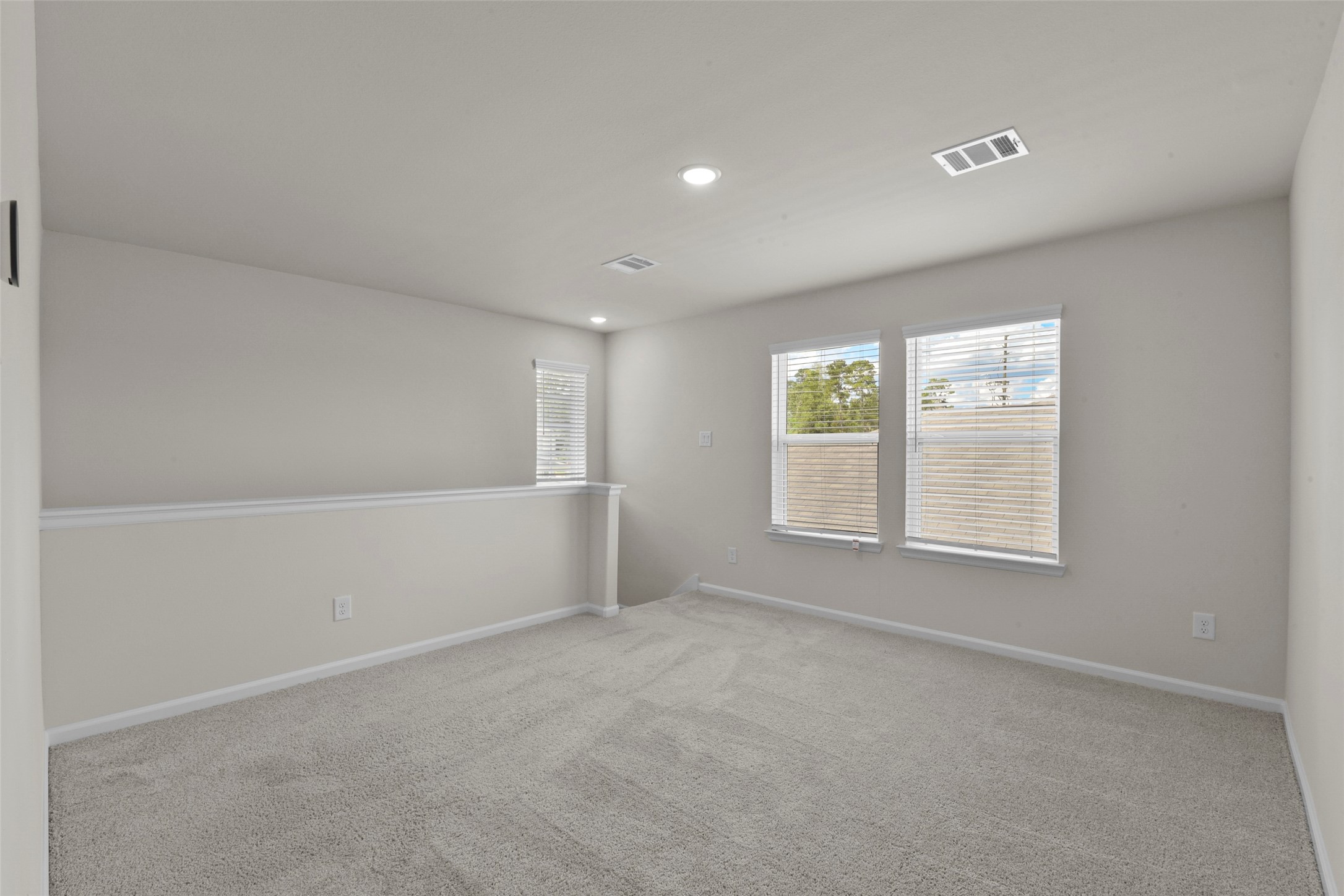 20811 Adventure Way Porter, TX 77365 - Photo 17 of 28 an empty room with windows