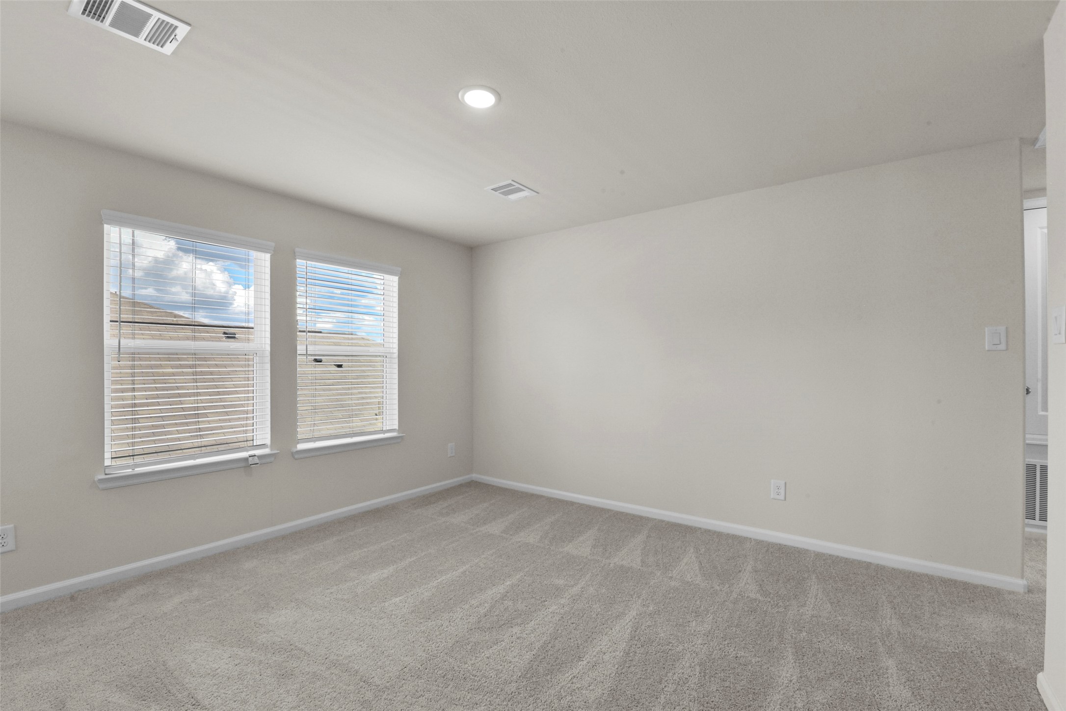 20811 Adventure Way Porter, TX 77365 - Photo 18 of 28 an empty room with windows