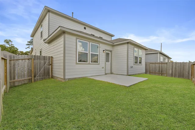 a view of a backyard with a garden