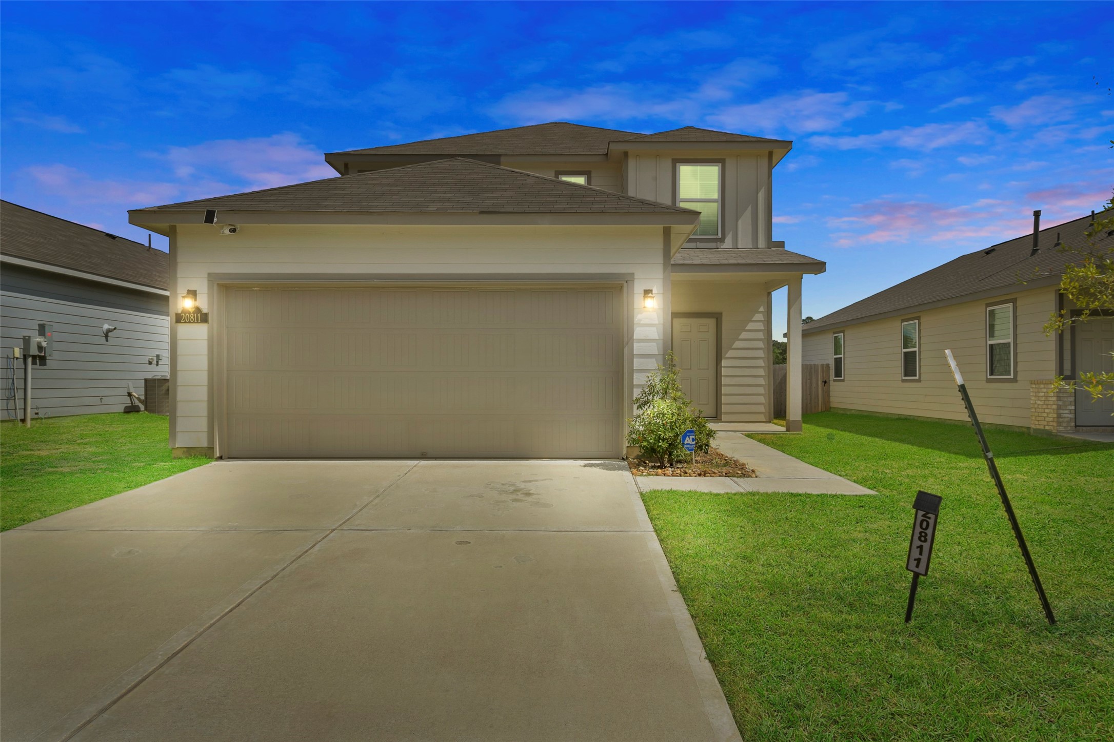 20811 Adventure Way Porter, TX 77365 - Photo 3 of 28 a front view of a house with a yard