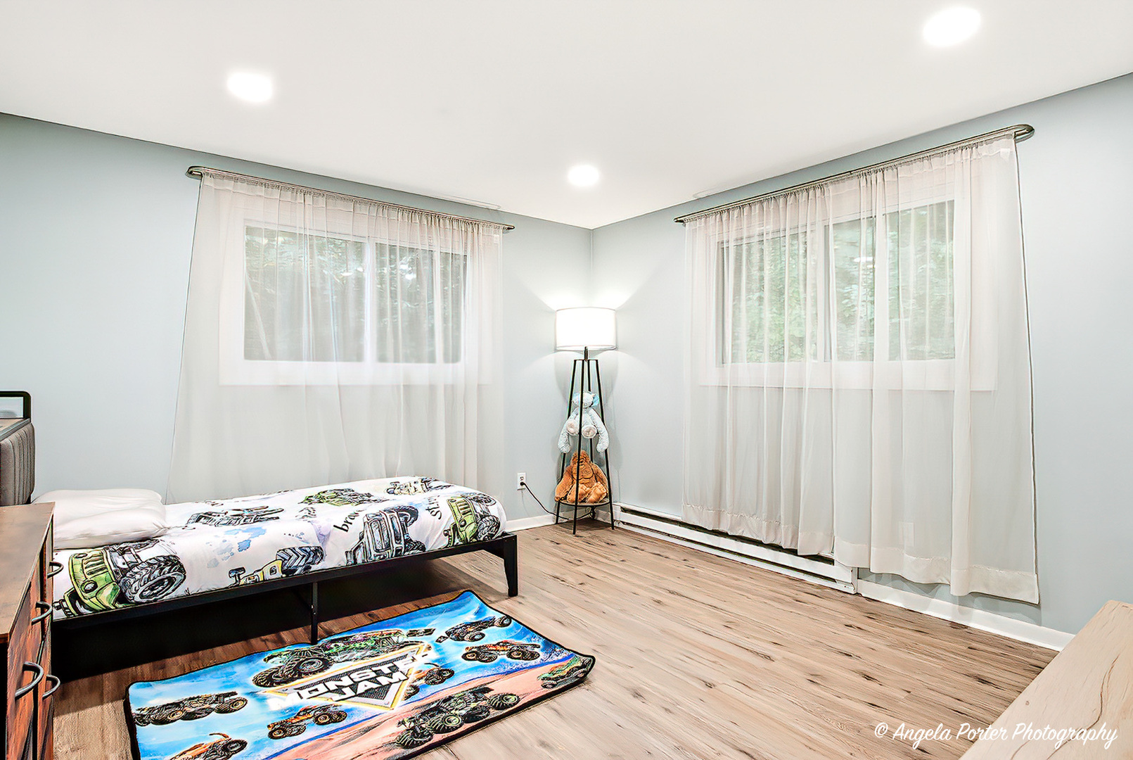 5703 Fox Lake Road McHenry, IL 60051 - Photo 12 of 20 a bed room with a bed and a window