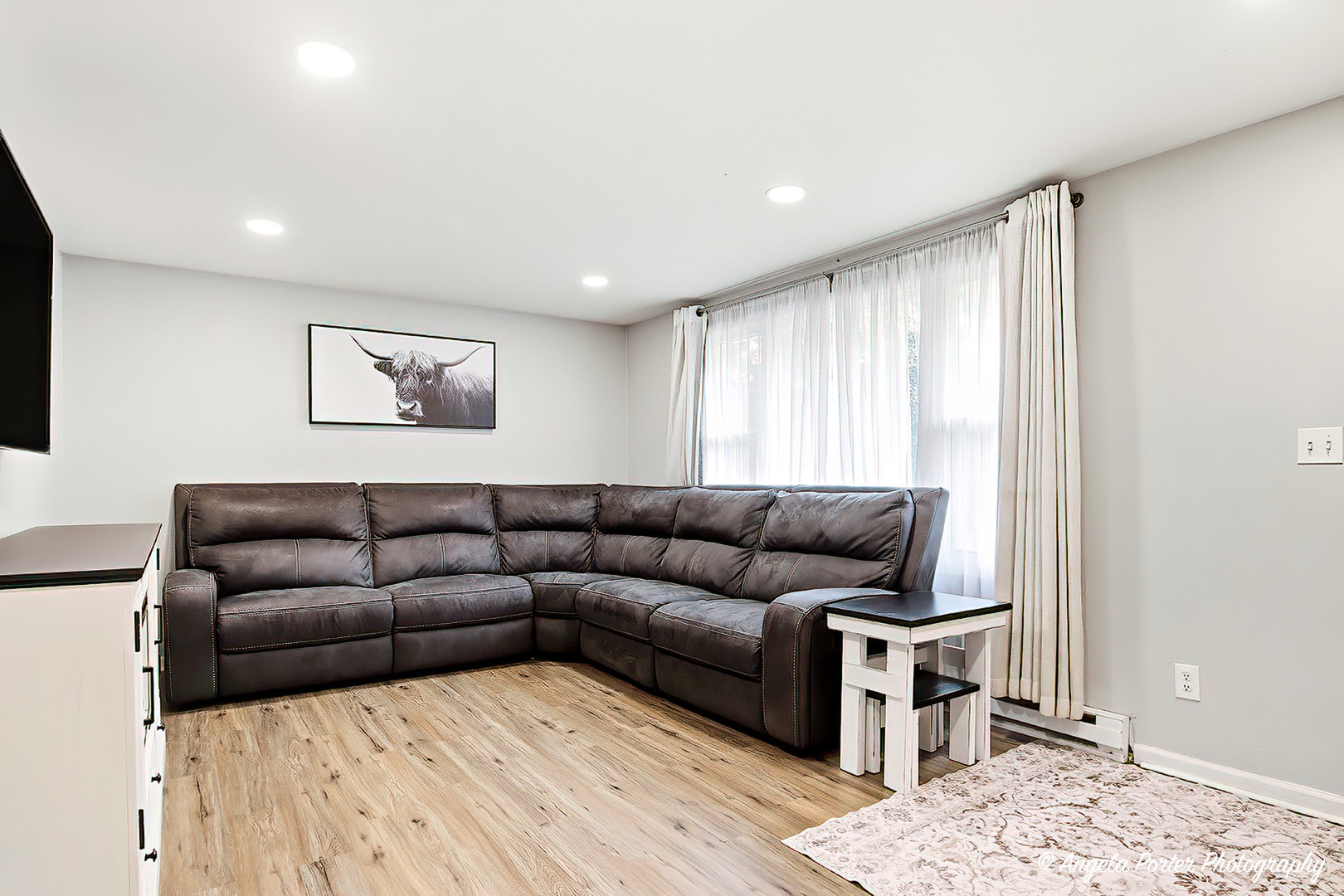 5703 Fox Lake Road McHenry, IL 60051 - Photo 10 of 20 a living room with furniture and a rug