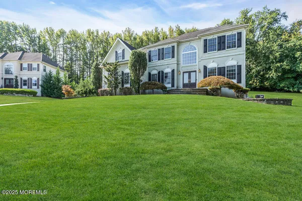 a view of a yard in front of a house