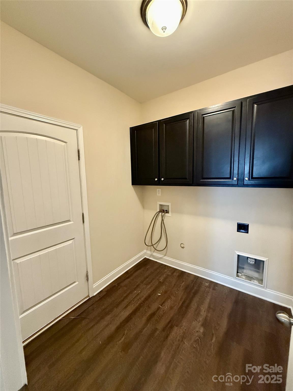 4048 Avis Way Monroe, NC 28110 - Photo 11 of 23 a view of a storage & utility room with wooden floor
