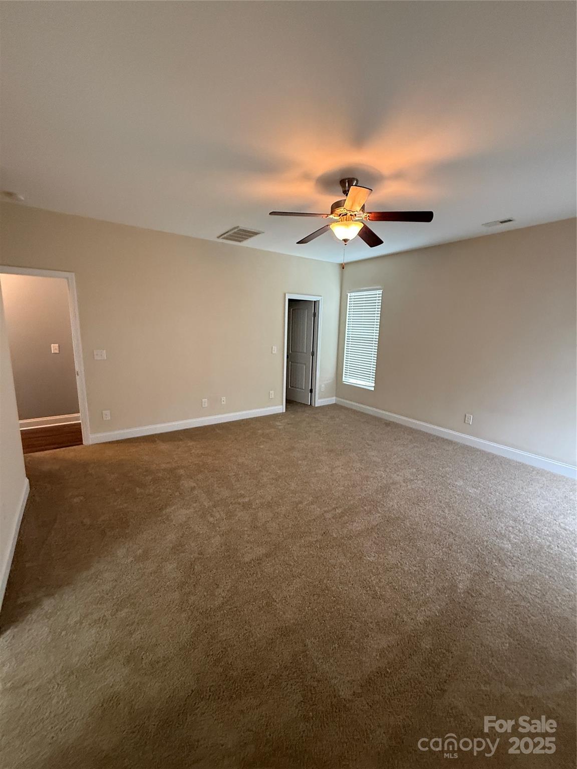4048 Avis Way Monroe, NC 28110 - Photo 13 of 23 a view of a big room with carpet