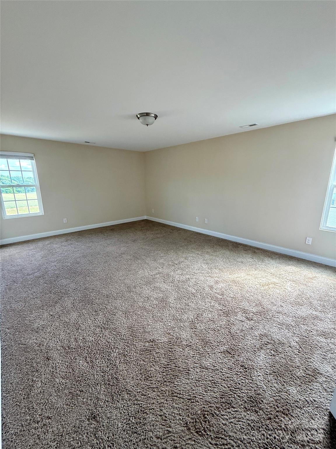4048 Avis Way Monroe, NC 28110 - Photo 19 of 23 an empty room with a window