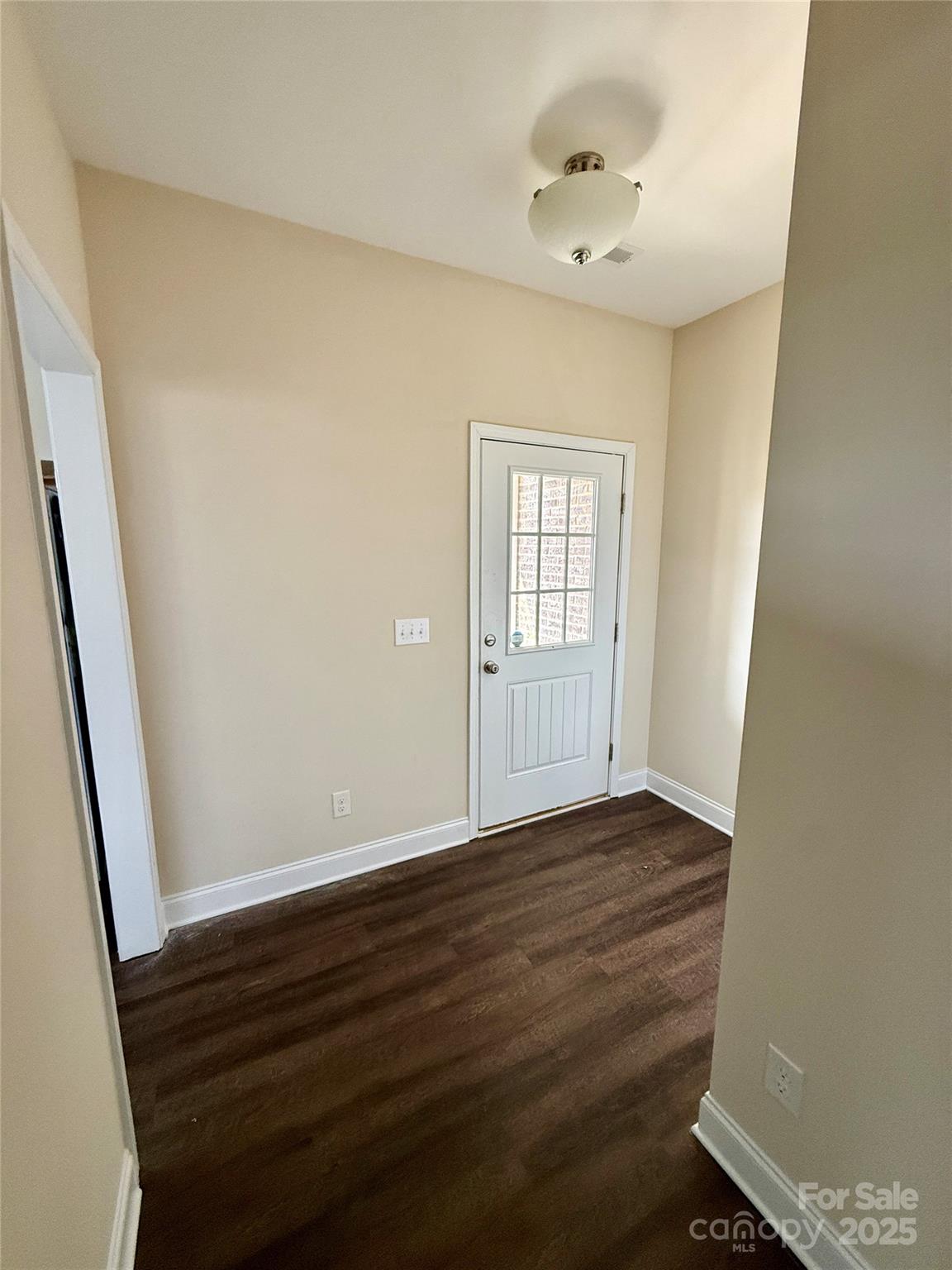 4048 Avis Way Monroe, NC 28110 - Photo 4 of 23 a view of an empty room with a window