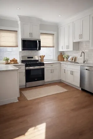a kitchen with stainless steel appliances granite countertop a stove top oven a sink dishwasher and a microwave oven on the blue kitchen countertops with wooden floor