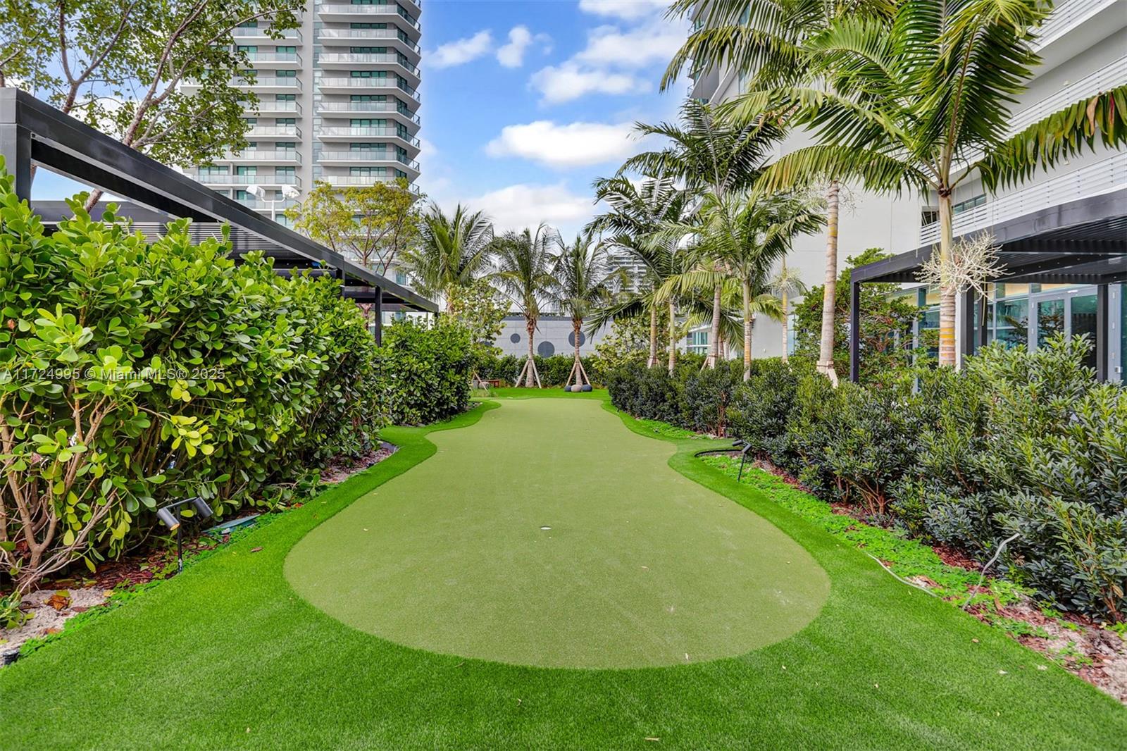 650 Northeast 32nd Street, Unit 1008 Miami, FL 33137 - Photo 15 of 57 a view of a backyard with plants
