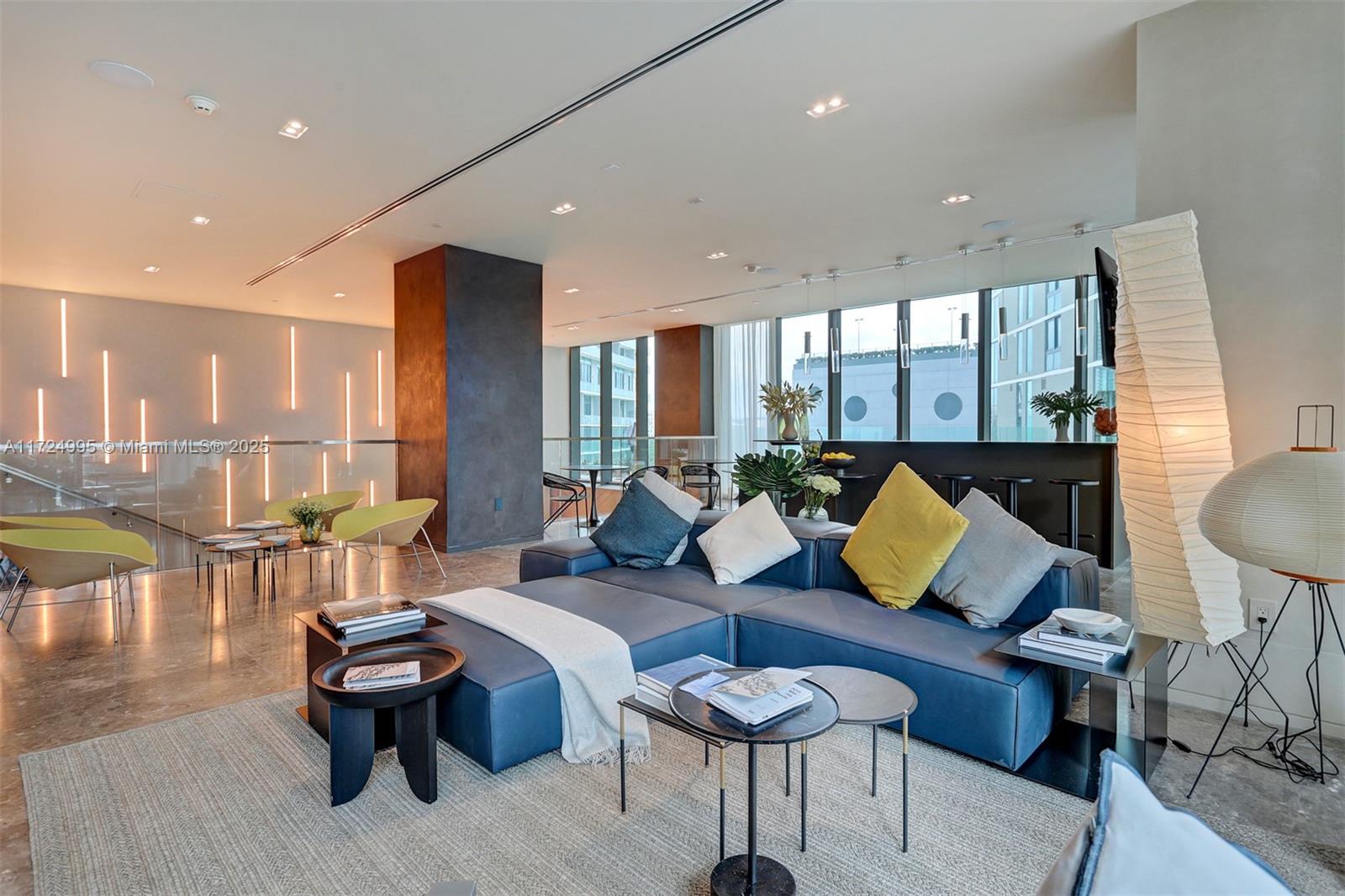 650 Northeast 32nd Street, Unit 1008 Miami, FL 33137 - Photo 30 of 57 a living room with furniture and a large window