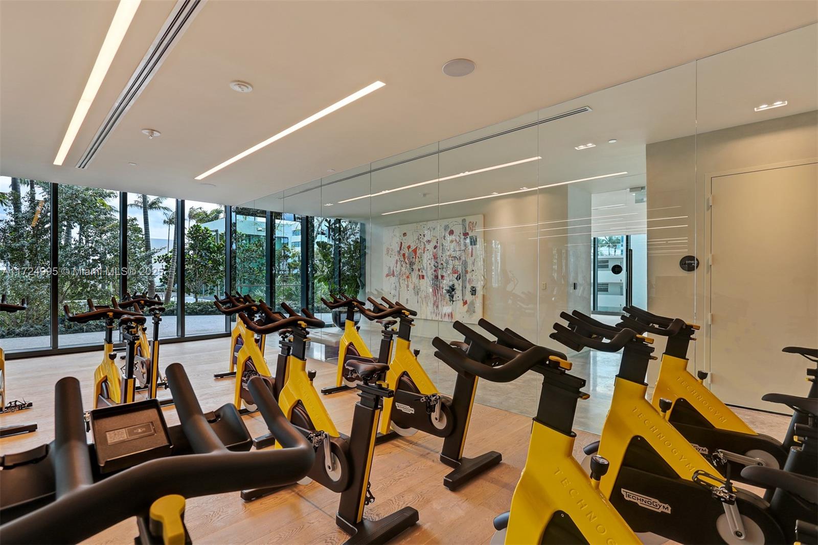 650 Northeast 32nd Street, Unit 1008 Miami, FL 33137 - Photo 38 of 57 a view of a room with gym equipment