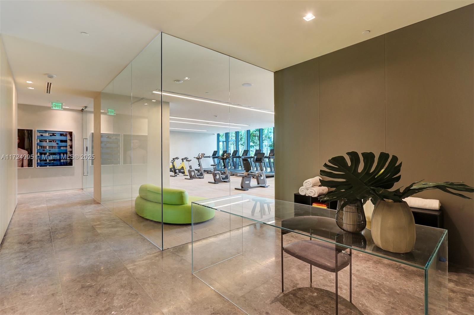 650 Northeast 32nd Street, Unit 1008 Miami, FL 33137 - Photo 40 of 57 a living room with furniture and a glass door