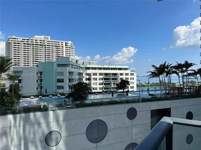 a bathroom with a sink a vanity and a mirror