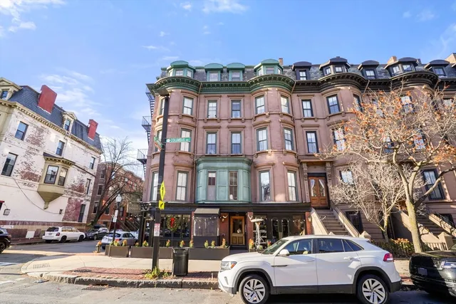 a car parked in front of a building
