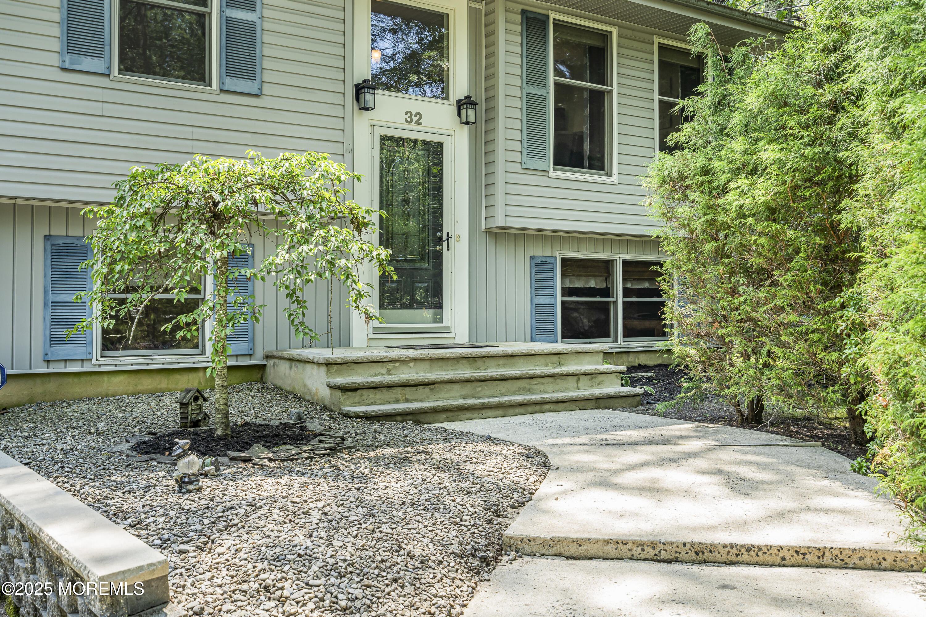32 Walter Drive Jackson, NJ 08527 - Photo 4 of 85 a view of a house with a yard and large tree