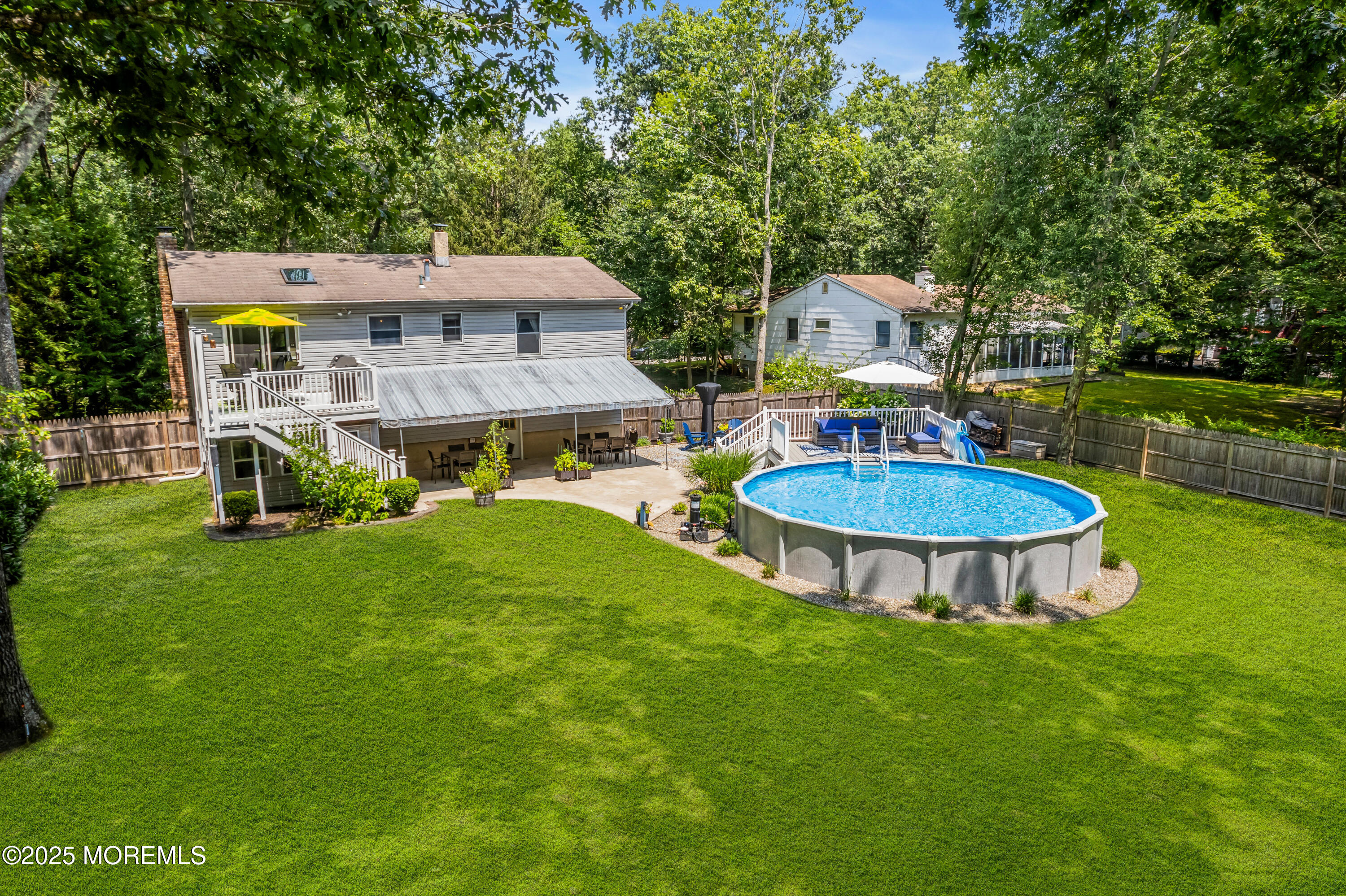 32 Walter Drive Jackson, NJ 08527 - Photo 50 of 85 a view of a house with a swimming pool and a yard