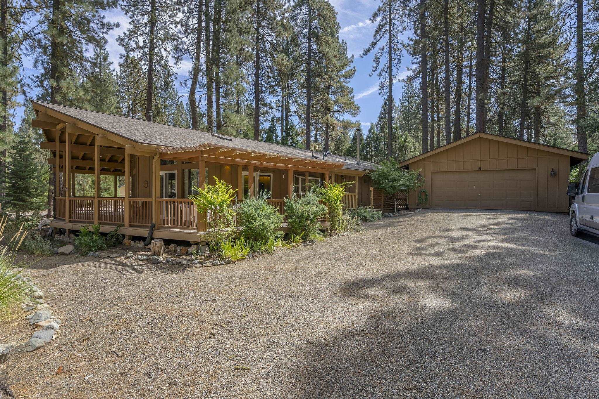 6 Hokan Trail Graeagle, CA 96103 - Photo 2 of 28 a view of a house with a yard and tree