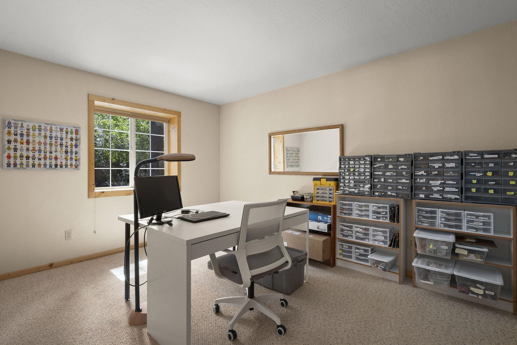 6 Hokan Trail Graeagle, CA 96103 - Photo 21 of 28 a view of a workspace with furniture and a window