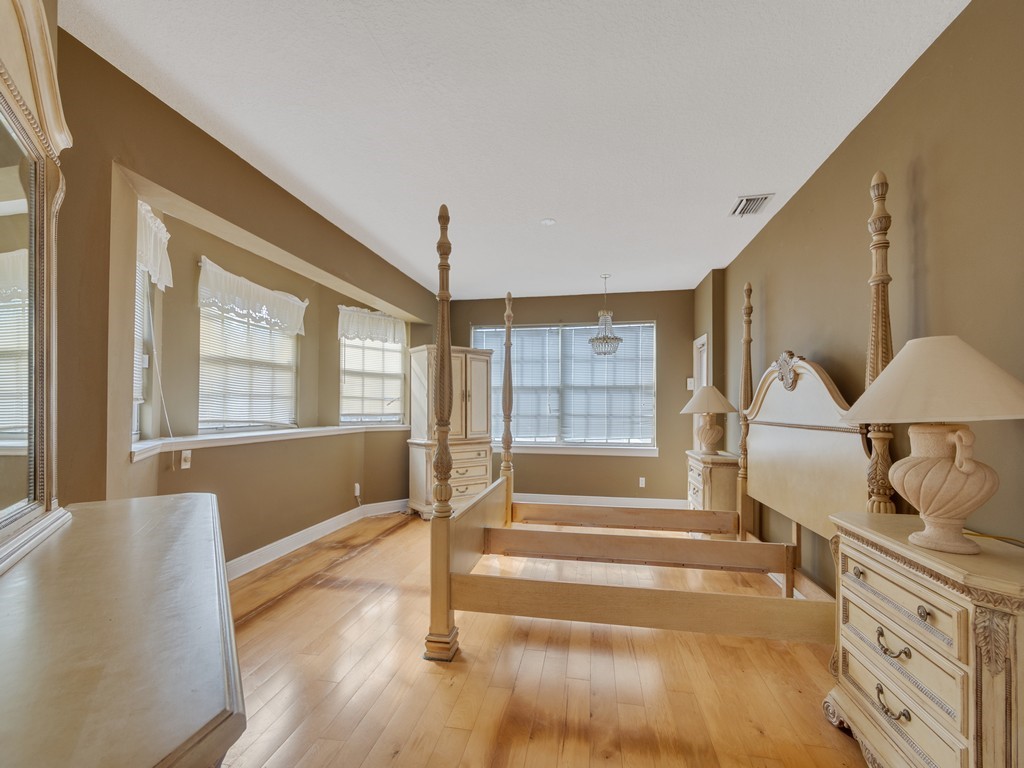 167 Deer Run Road Palm Bay, FL 32909 - Photo 19 of 35 a spacious bathroom with a tub and shower