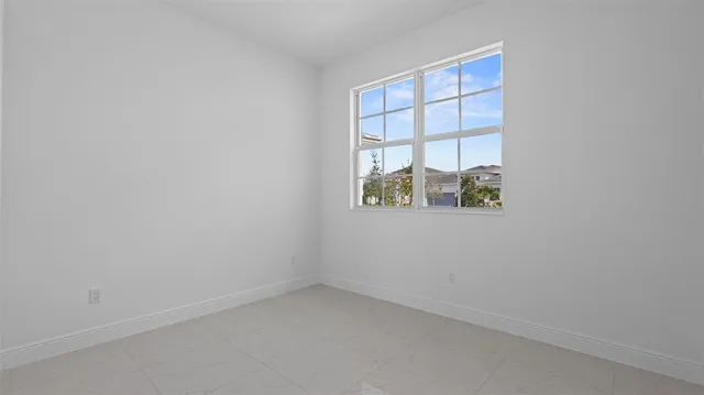 an empty room with a window